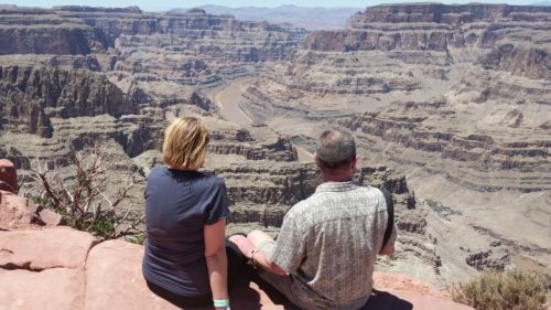 A couple overlooking the Grand Canyon