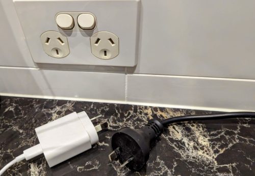 Two plugs unplugged by a double socket