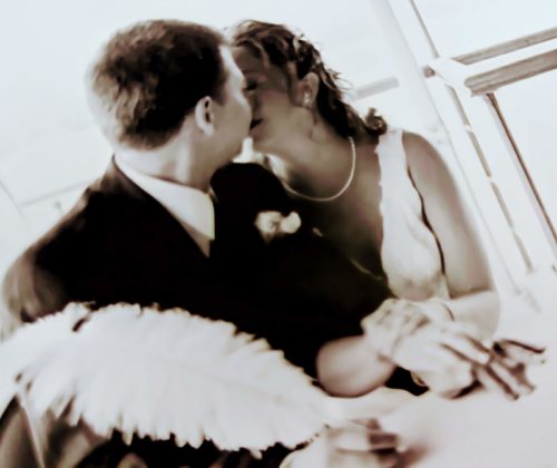 Bride & groom kissing